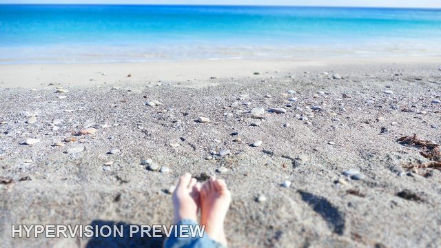 Bare Feet Together Facing Blue Sea
