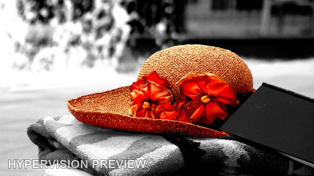 Selective-Colour Sun Hat Beside Pool Splash