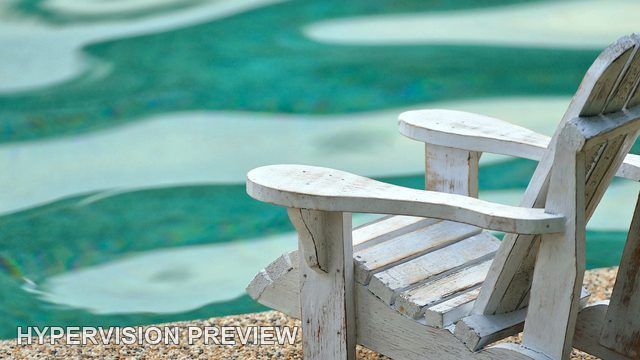 Close Crop of White Chair Arms by Water