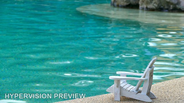 Poolside Miniature Chair Beneath Turquoise Reflections