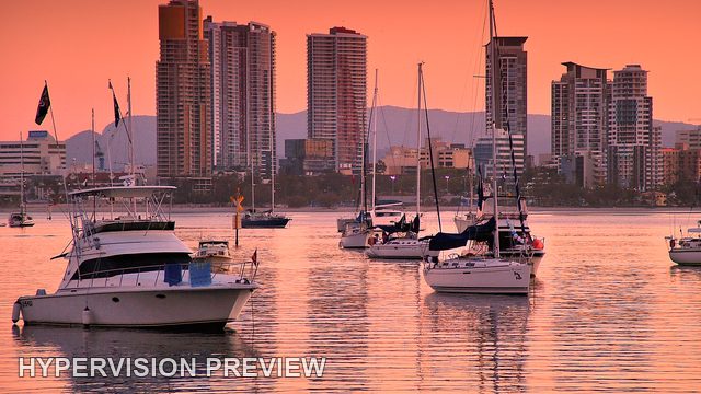 The Spit Yachts and High-Rise Skyline in Coral Light