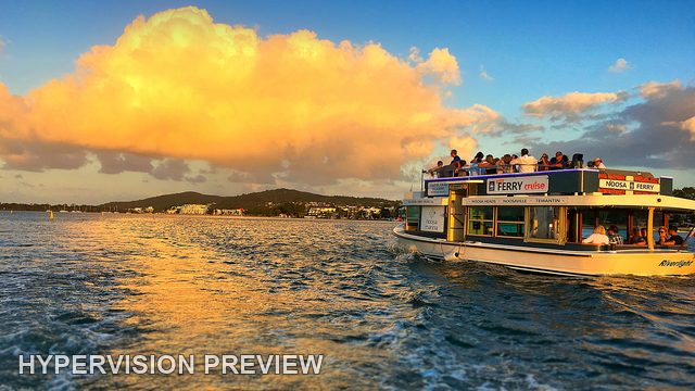 Noosa Ferry Beneath Golden Clouds