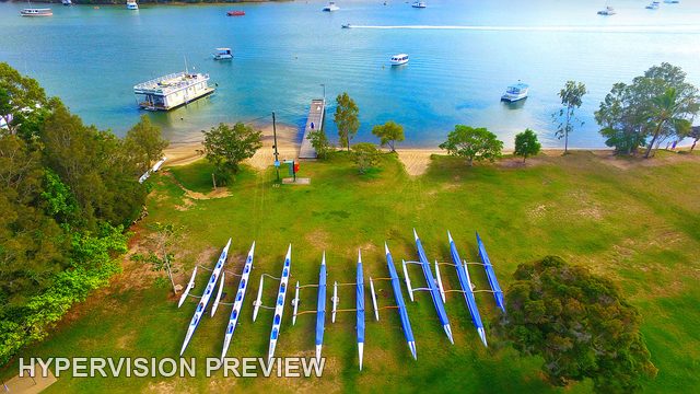 Rowing Craft Along the Grassy Foreshore