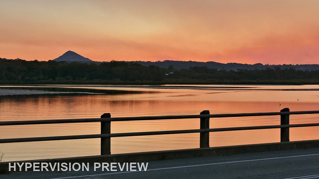 River and Road Railing at Pink Dusk