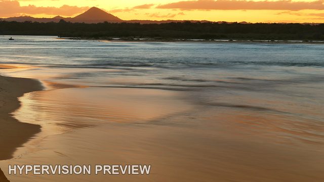 Soft Water and Distant Hill at Dusk