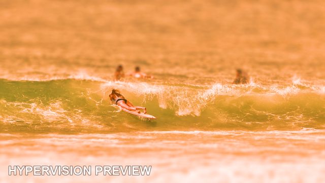 Surfer Crossing a Breaking Wave — Warm Colour