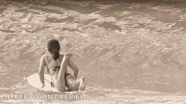 Resting on a Surfboard Between Waves — Sepia