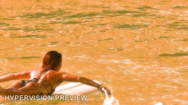 Surfer Paddling Across Clear Water — Warm Orange