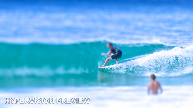 Surfer Riding a Steep Turquoise Wave — Cool Blue / Selective Focus 02