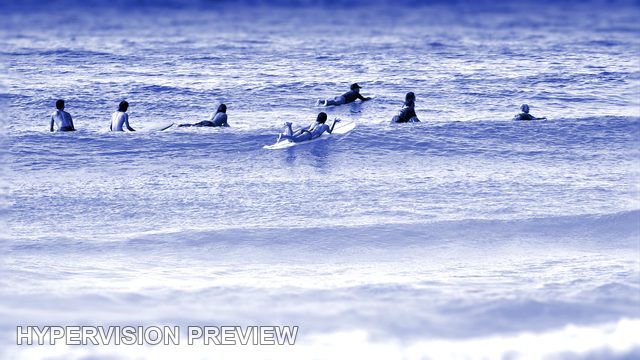 Surfers Waiting for the Next Set — Cool Blue