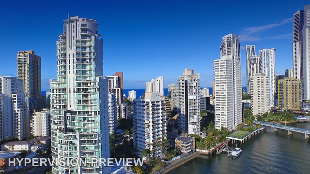 Gold Coast Riverside Towers Beneath a Deep Blue Sky