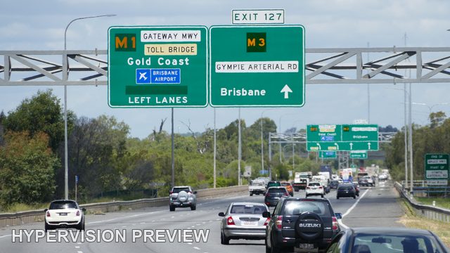 Vehicles Following the Brisbane and Gold Coast Signs