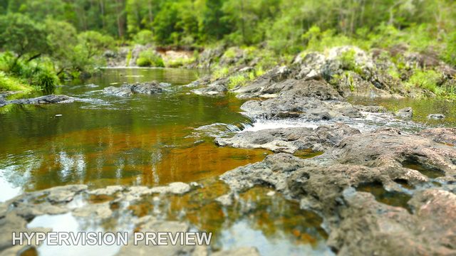 Wappa River Reflections along a Rocky Bank