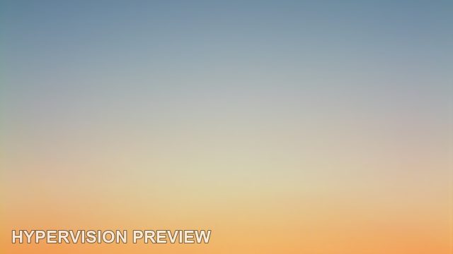 Glass House Mountain Silhouettes beneath an Orange Horizon