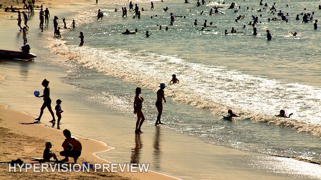 Swimmers and Walkers Along the Surf Line — Warm Edit