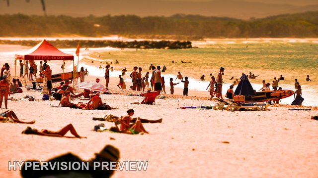 Sunbathers and a Red Beach Canopy — Warm Edit