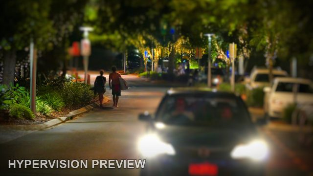 Car Approaching Along a Noosa Street After Dark