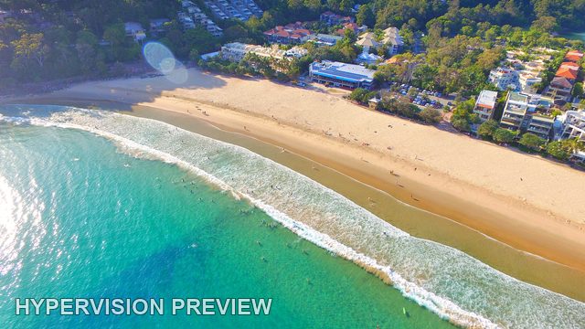 Main Beach Surf Below Coastal Buildings