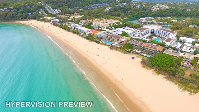 Curving Main Beach and Turquoise Shallows
