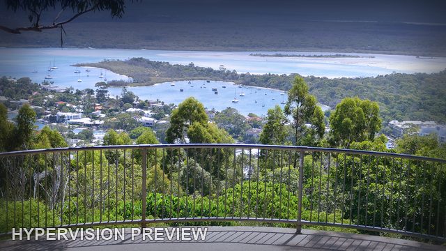 Waterways and Coast Beyond a Lookout Railing