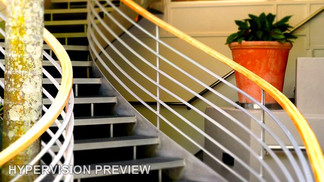 Curved Staircase with Timber Handrail