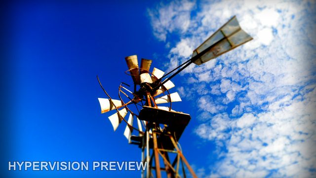Windmill Rotor and Tail with Soft Focus and Blue Sky