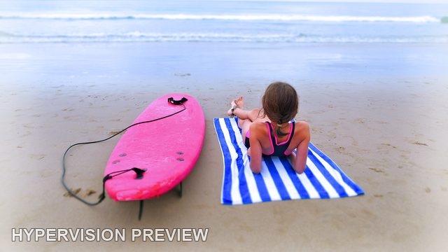 Soft Coastal View of a Child on a Beach Towel