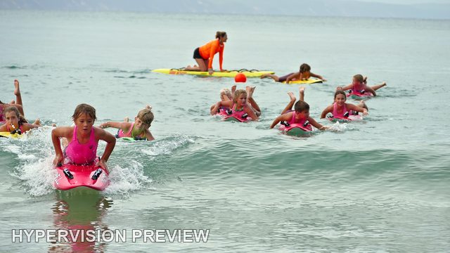 Young Board Riders in Gentle Surf