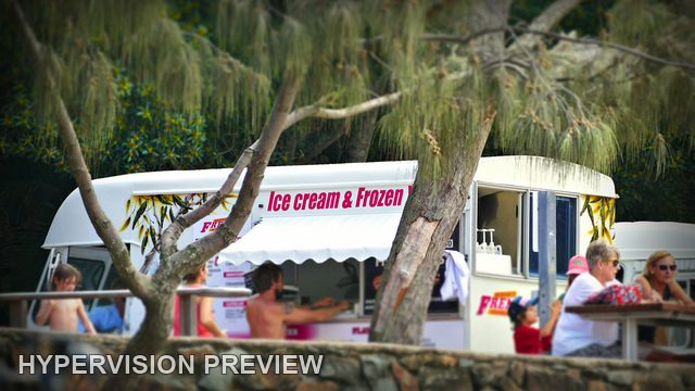 Ice Cream Kiosk Behind Coastal Trees